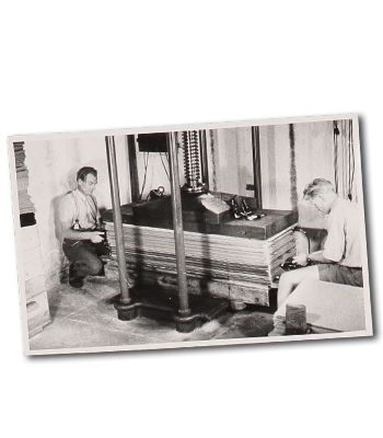 Two farm women delivering raw new wool to Johann Steiner.